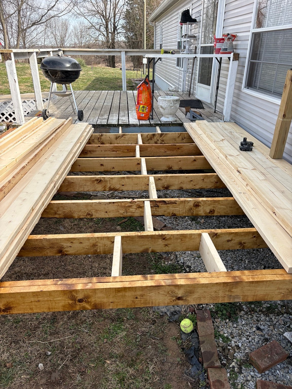 Wood deck framing under construction