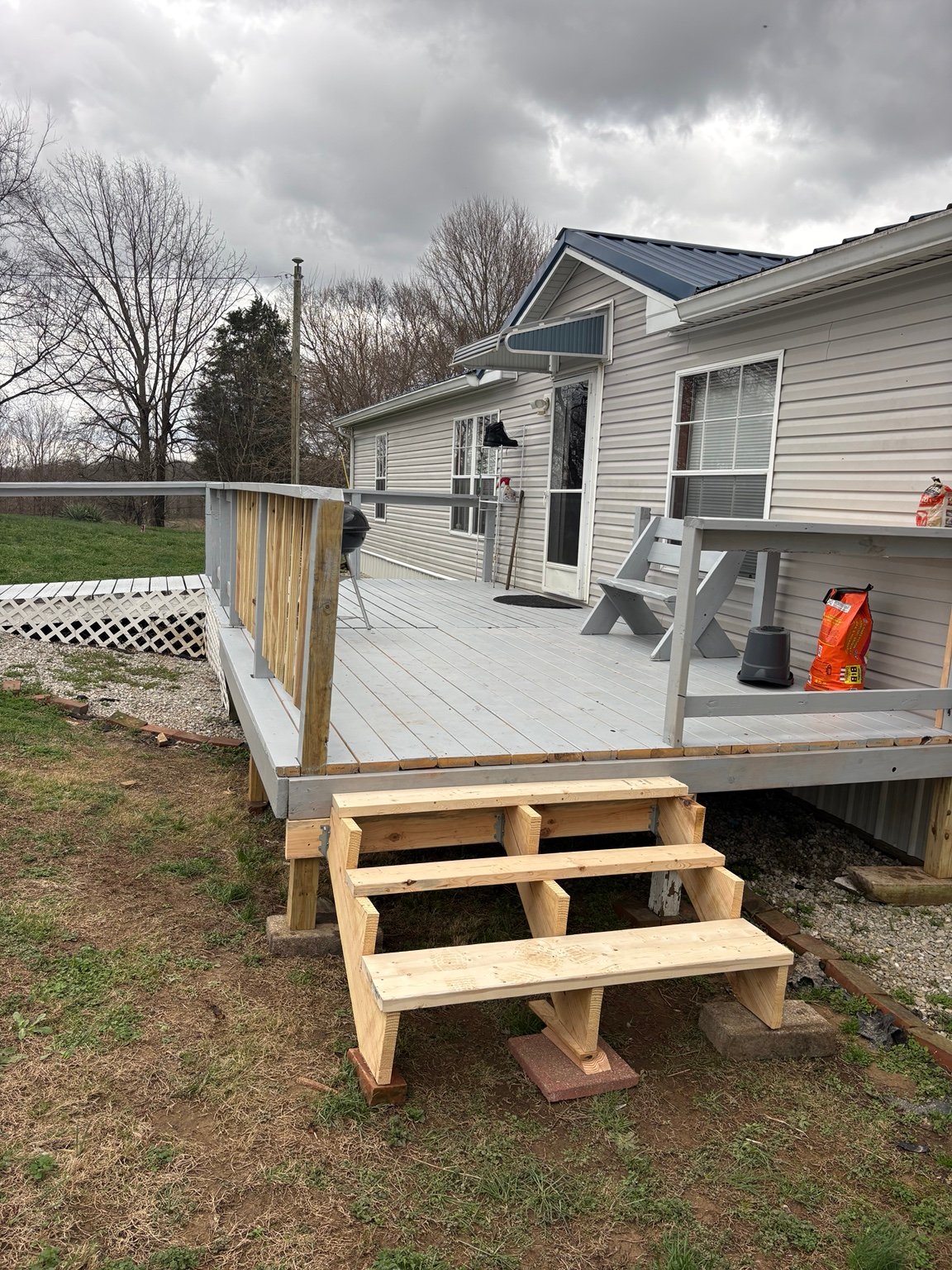 Rebuilt wood steps and deck railing work